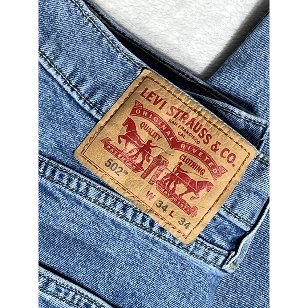 Levi's 502 Regular Taper Jeans Mens 34x34 Medium Wash Blue Stretch Denim